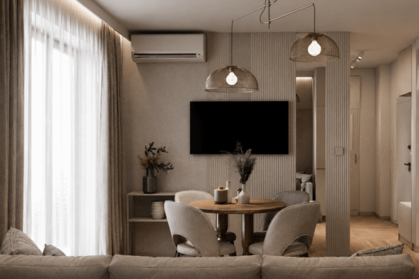 Projekt eleganckiego wnętrza salonu z kuchnią wykonany przez In Design Home